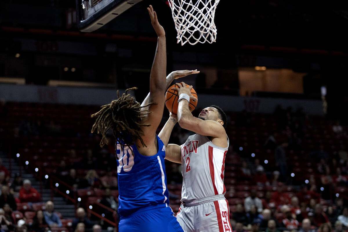 UNLV Rebels guard Justin Webster (2) shoots against Hofstra Pride forward Silas Sunday (30) dur ...