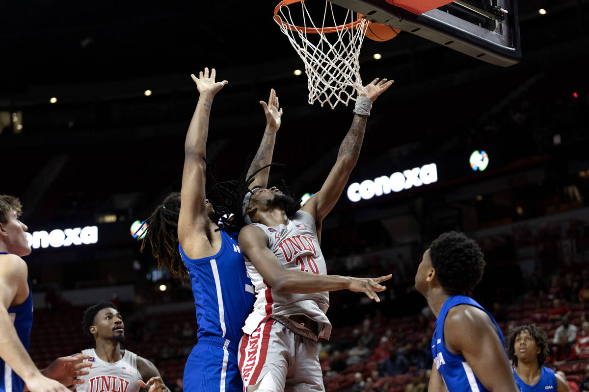 UNLV Rebels forward Keylan Boone (20) shoots against Hofstra Pride forward Silas Sunday (30) du ...