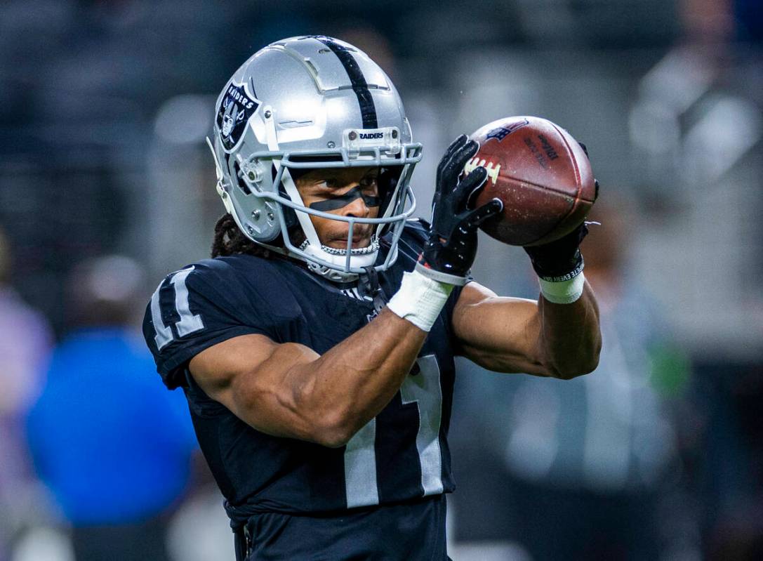 Raiders wide receiver Tre Tucker (11) catches a pass during warmups before the first half of th ...