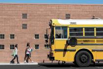 RJ FILE*** JOHN LOCHER/LAS VEGAS REVIEW-JOURNAL A school bus idles in the parking lot of the Ma ...