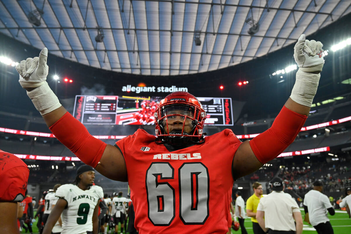 UNLV offensive lineman Amani Trigg-Wright (60) celebrates after UNLV defeated Hawaii in an NCAA ...