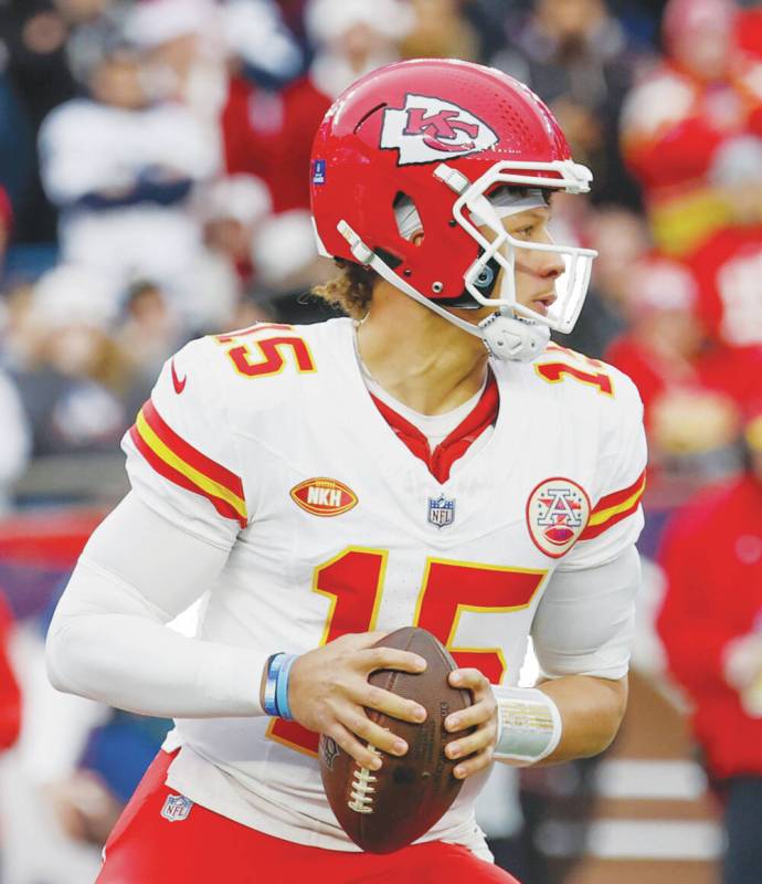 Kansas City Chiefs quarterback Patrick Mahomes (15) drops back to make a pass during the first ...