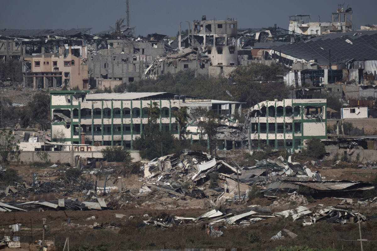 Destroyed farms and buildings in the Gaza Strip as seen from Southern Israel, Friday, Dec. 22, ...