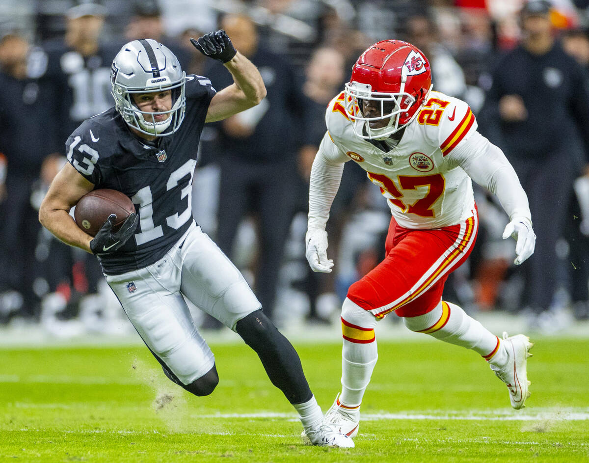 Raiders wide receiver Hunter Renfrow (13) runs after a reception as Kansas City Chiefs safety C ...