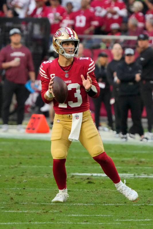 San Francisco 49ers quarterback Brock Purdy (13) throws the ball against the Arizona Cardinals ...