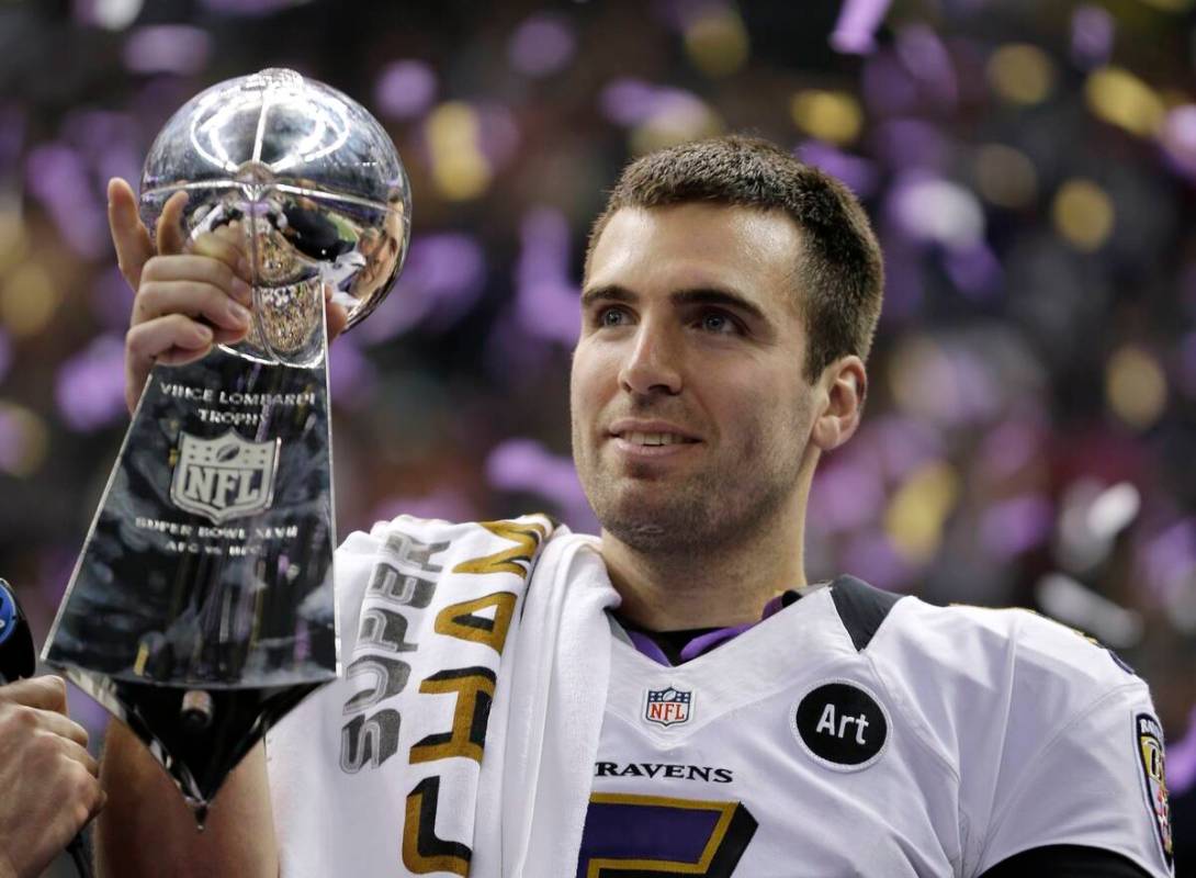 FILE - In this Feb. 13, 2013 file photo, Baltimore Ravens quarterback Joe Flacco (5) holds the ...