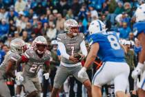 UNLV quarterback Jayden Maiava (1) gets ready to pass the ball onto running back Courtney Reese ...