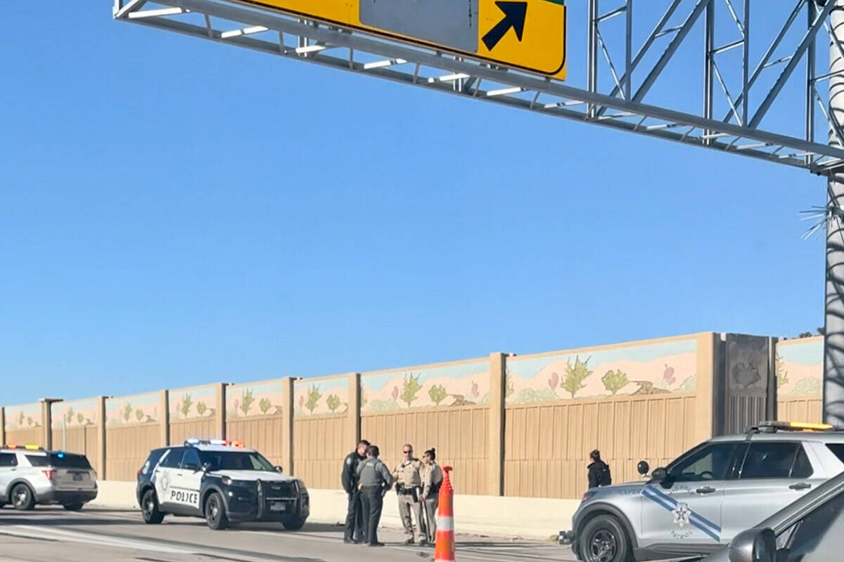 Homicide investigators with the Las Vegas Metropolitan Police Department were responding after ...