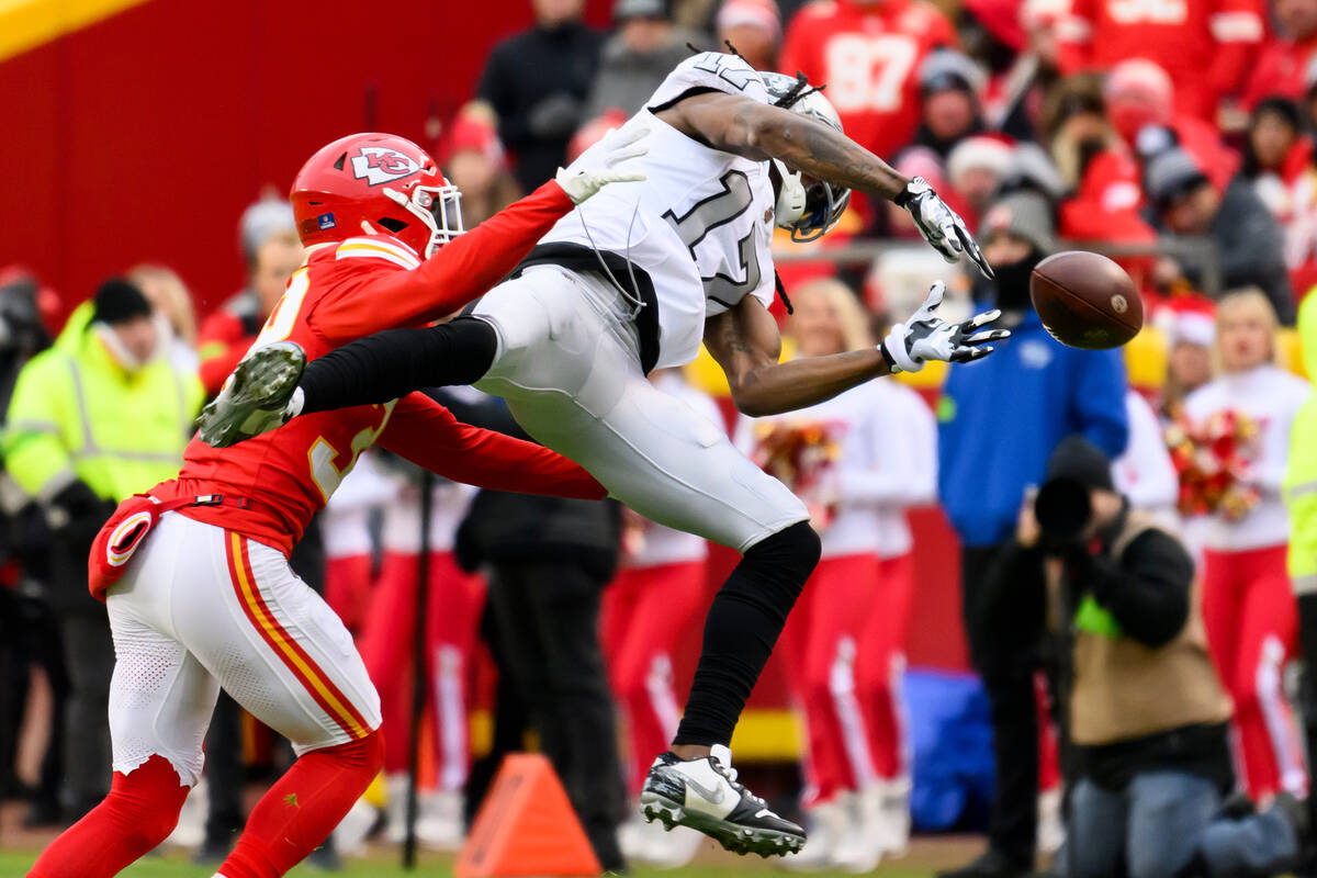 Las Vegas Raiders wide receiver Davante Adams (17) can't make the catch while being covered by ...