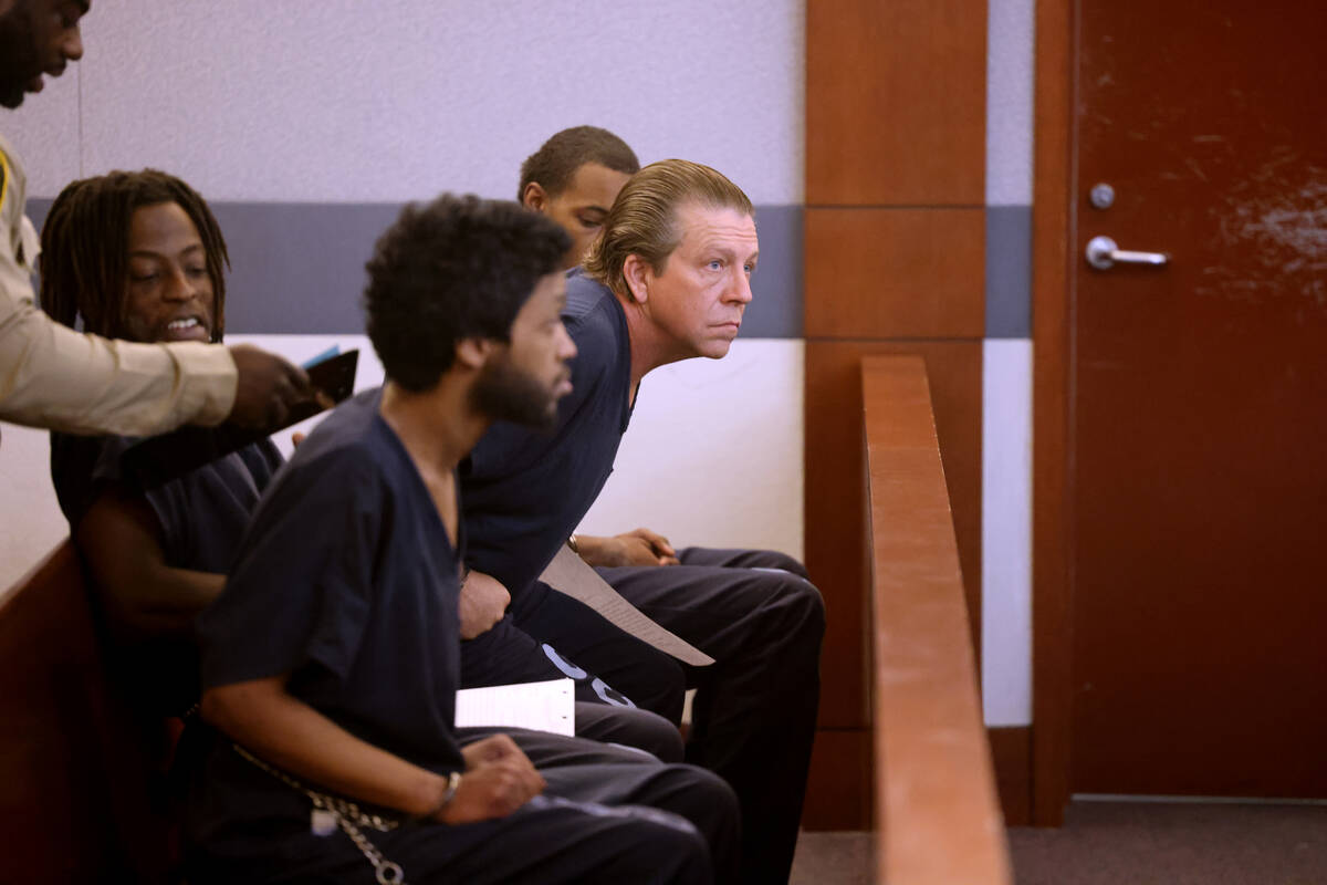 Christopher Hall, who is accused in a fatal shooting involving a stolen car, appears in court a ...