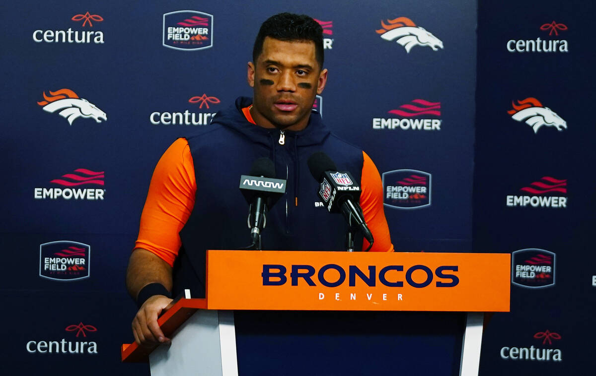 Denver Broncos quarterback Russell Wilson speaks during a news conference after an NFL football ...
