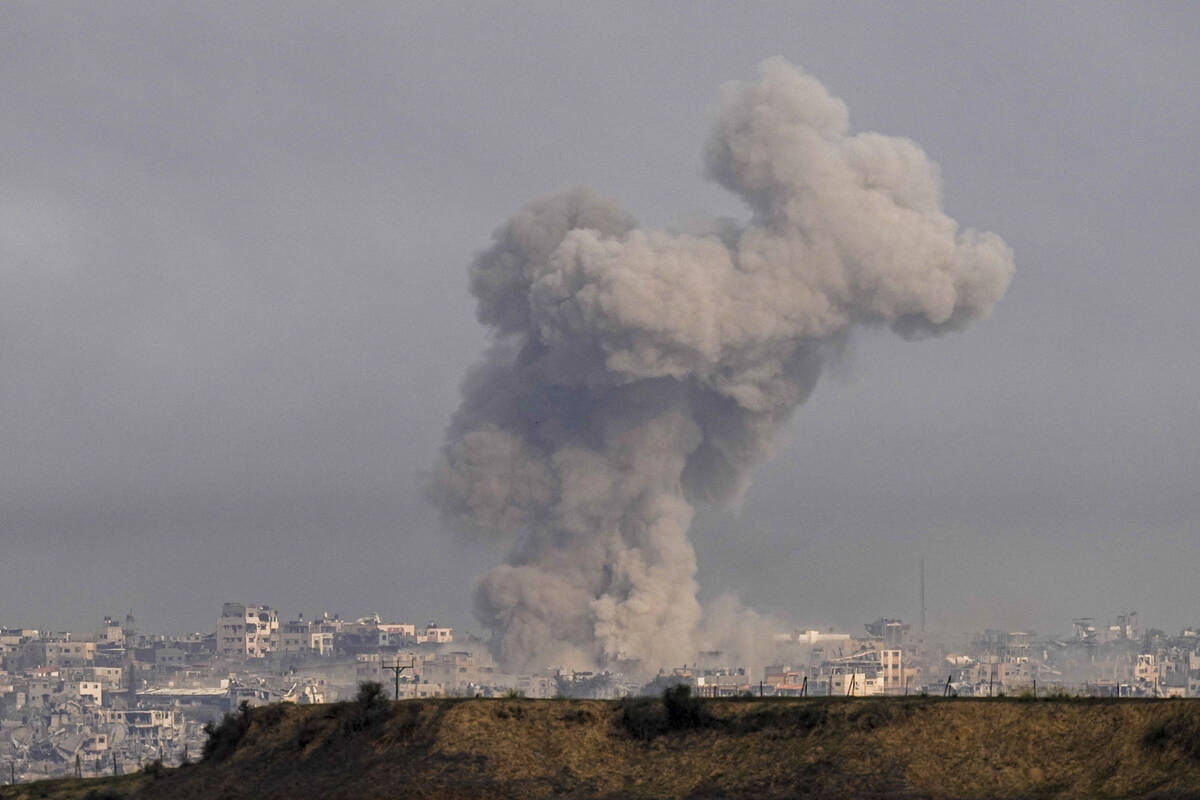 Smoke rises following an Israeli bombardment in the Gaza Strip, as seen from southern Israel, W ...