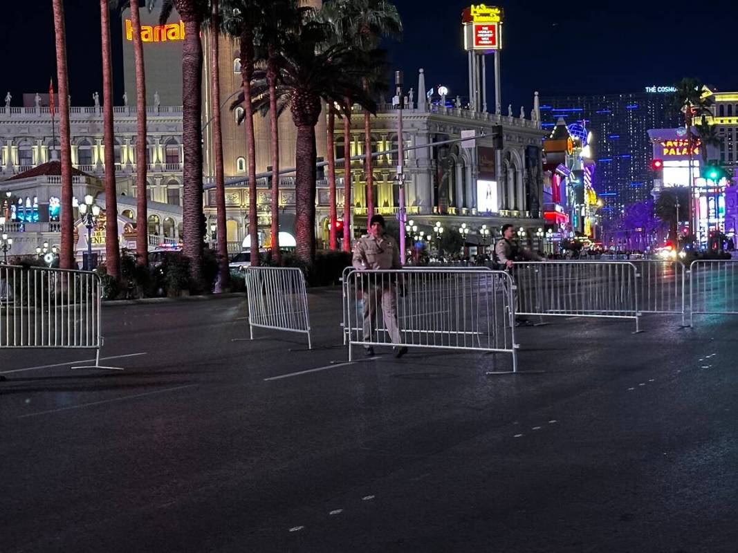 Barriers are put in place on Las Vegas Boulevard in front of The Venetian and the Mirage on Sun ...