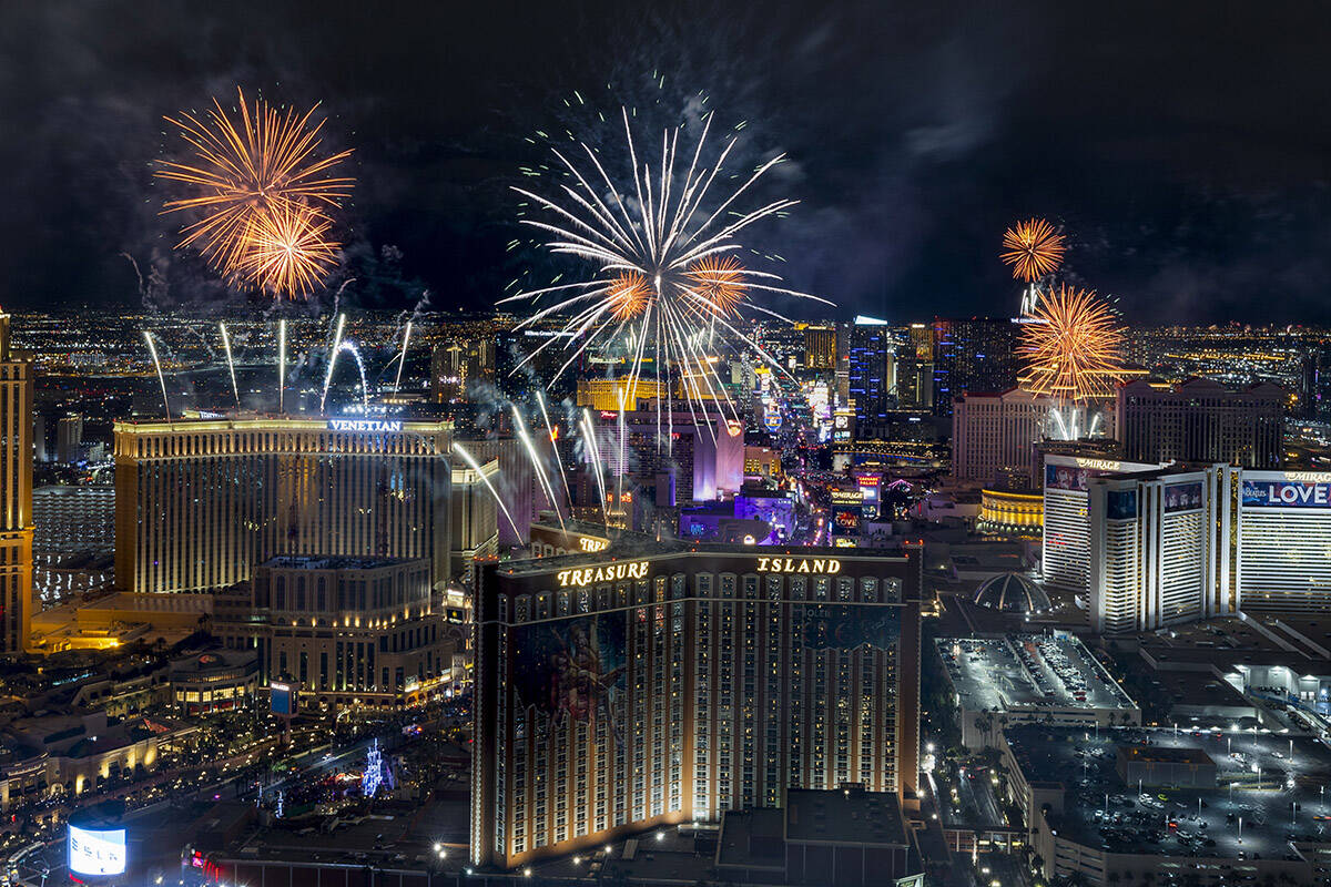 New Year’s Eve fireworks erupt above the Strip viewed from atop the Trump Tower on Sunda ...