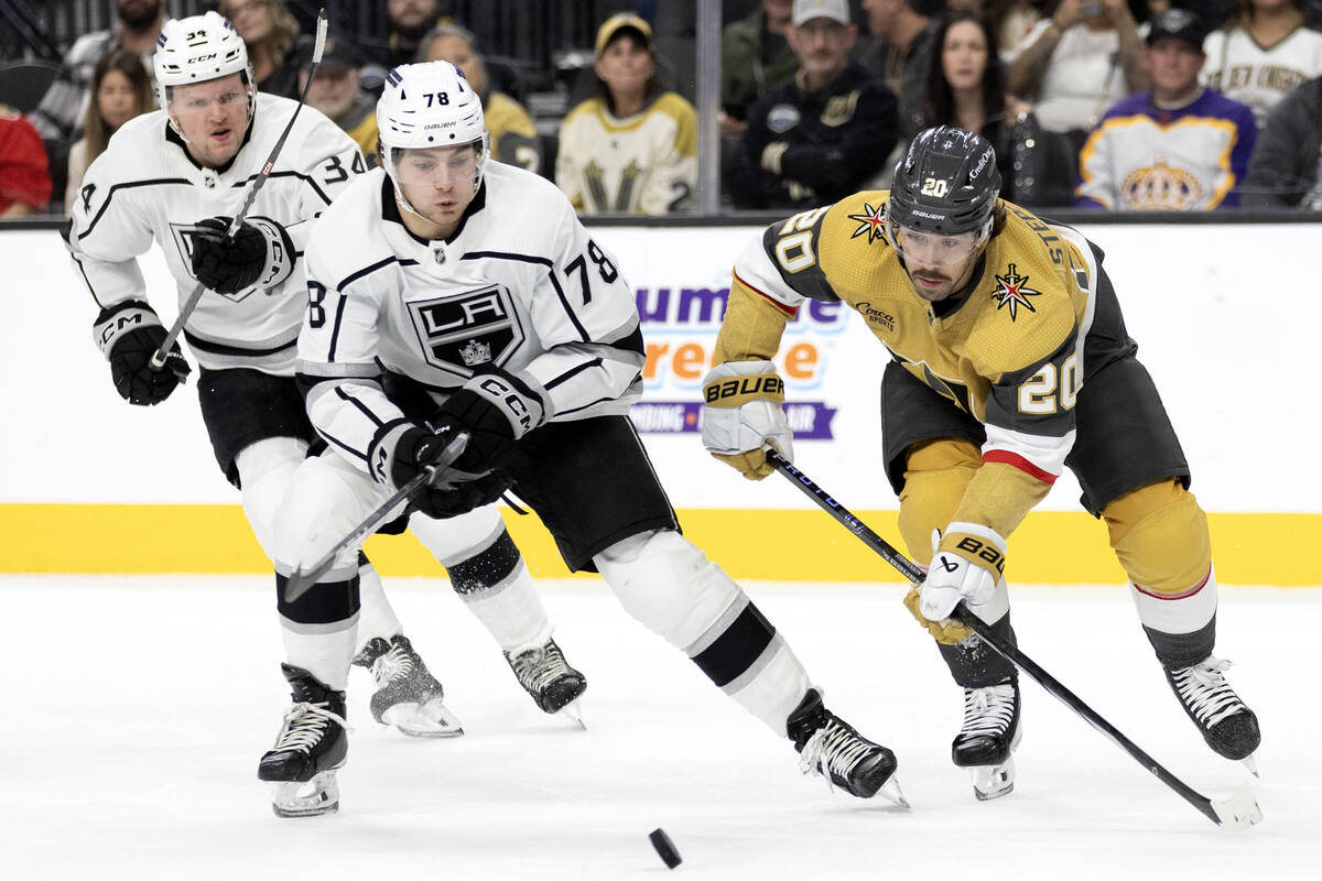 Kings right wing Alex Laferriere (78) and Golden Knights center Chandler Stephenson (20) skate ...