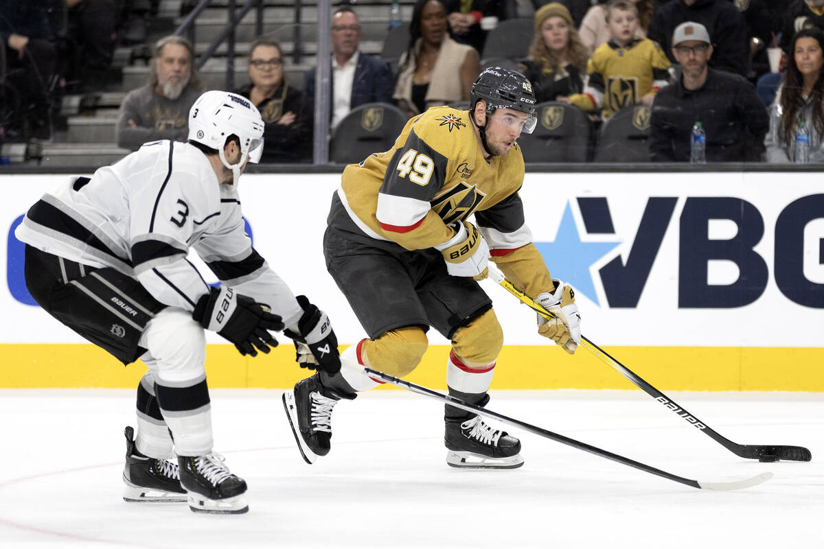 Golden Knights center Ivan Barbashev (49) drives toward the net against Kings defenseman Matt R ...