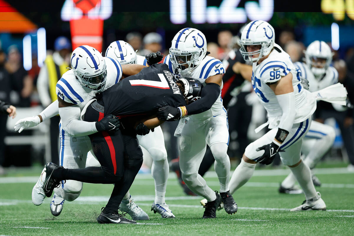 Indianapolis Colts defensive end Kwity Paye (51) and Indianapolis Colts cornerback Kenny Moore ...