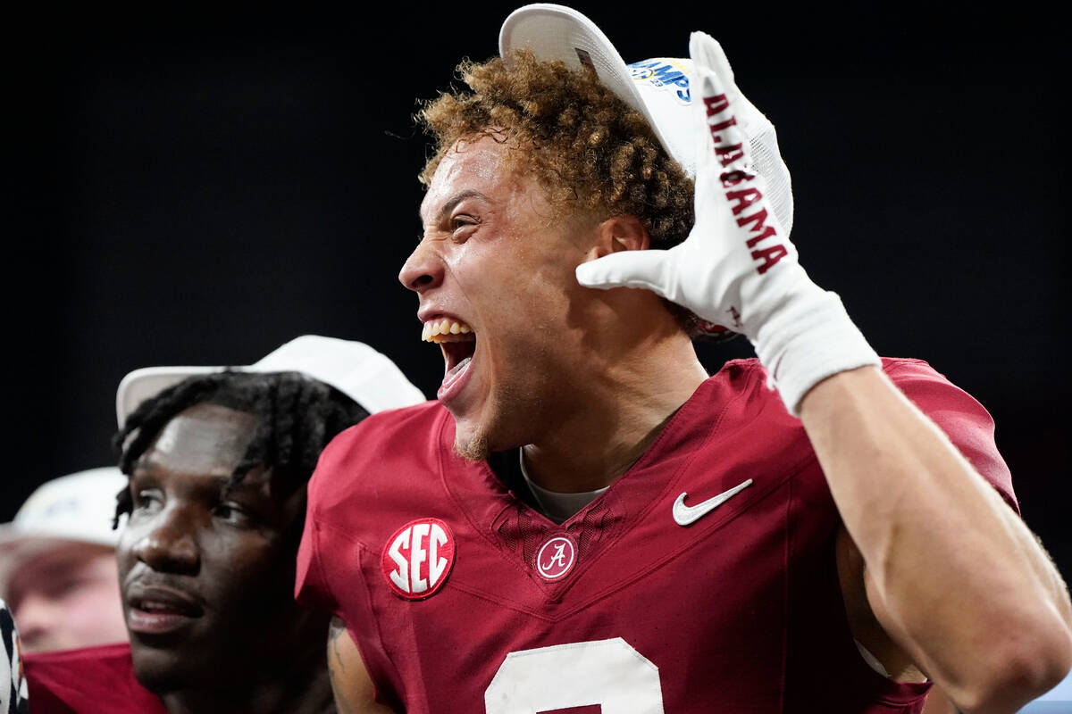 Alabama wide receiver Jermaine Burton (3) celebrates after a win against Georgia after the Sout ...