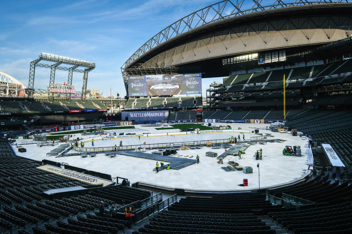 Construction of the ice rink at T-Mobile Park continues on Thursday, Dec. 21, 2023 in Seattle. ...