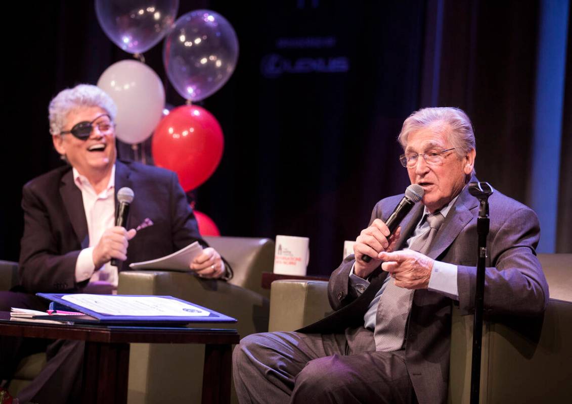 Review-Journal columnist Norm Clarke laughs while comedian Shecky Greene tells a story during C ...