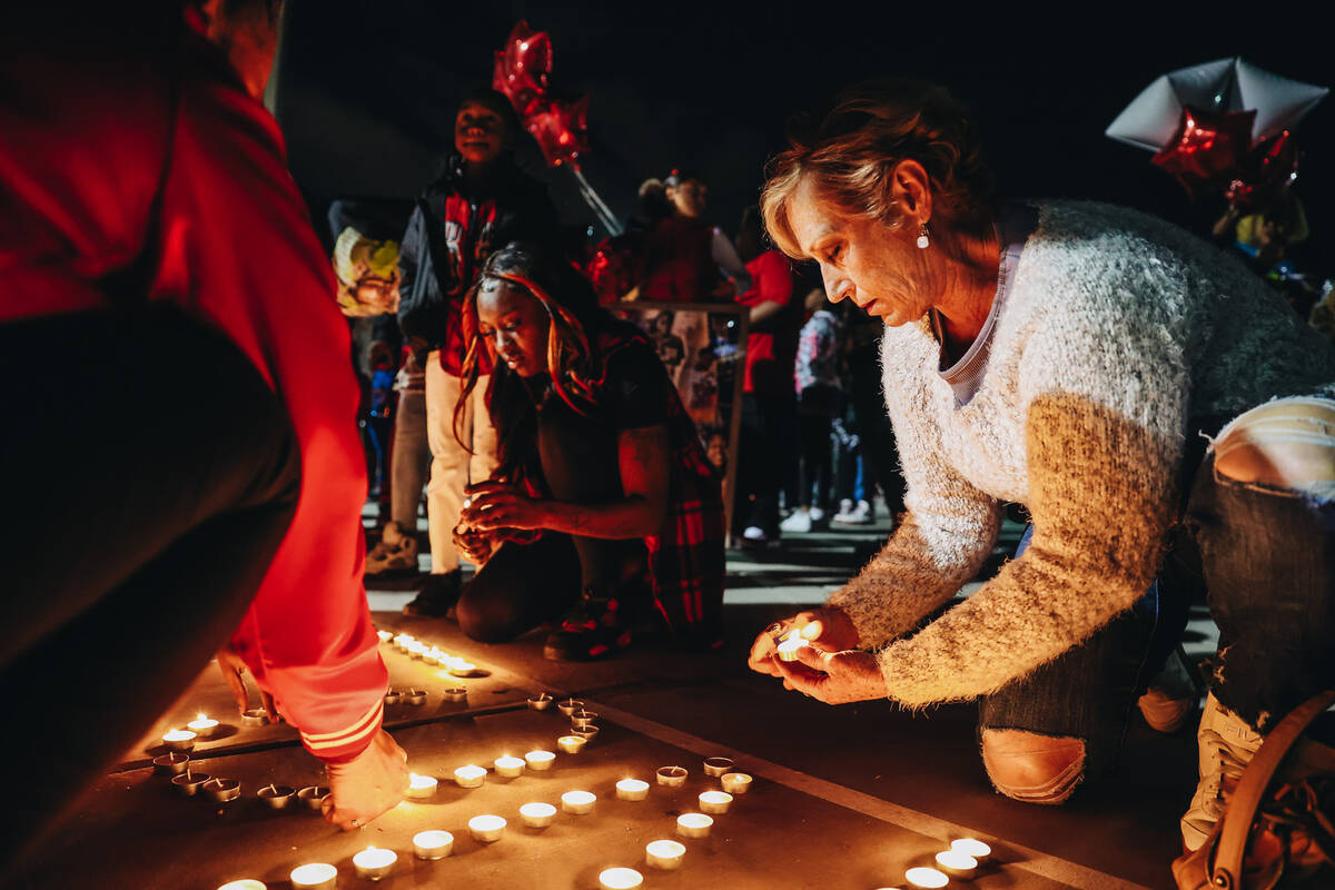 Candles are lit during a vigil in honor of Keon Young at Desert Horizons Park on Friday, Dec. 2 ...