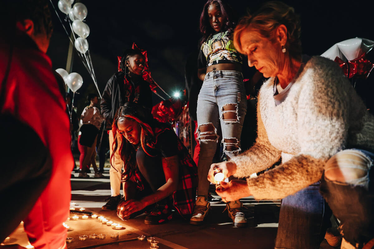 Candles are lit during a vigil in honor of Keon Young at Desert Horizons Park on Friday, Dec. 2 ...