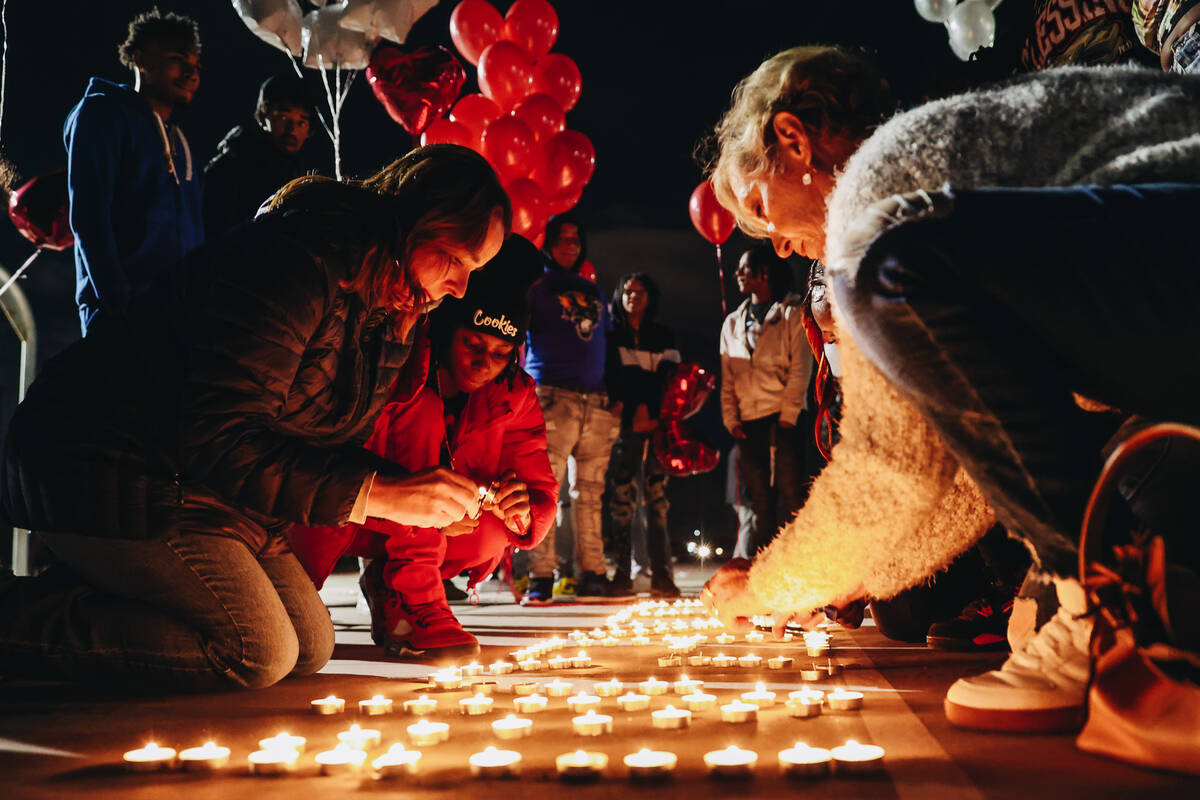 Candles are lit during a vigil in honor of Keon Young at Desert Horizons Park on Friday, Dec. 2 ...