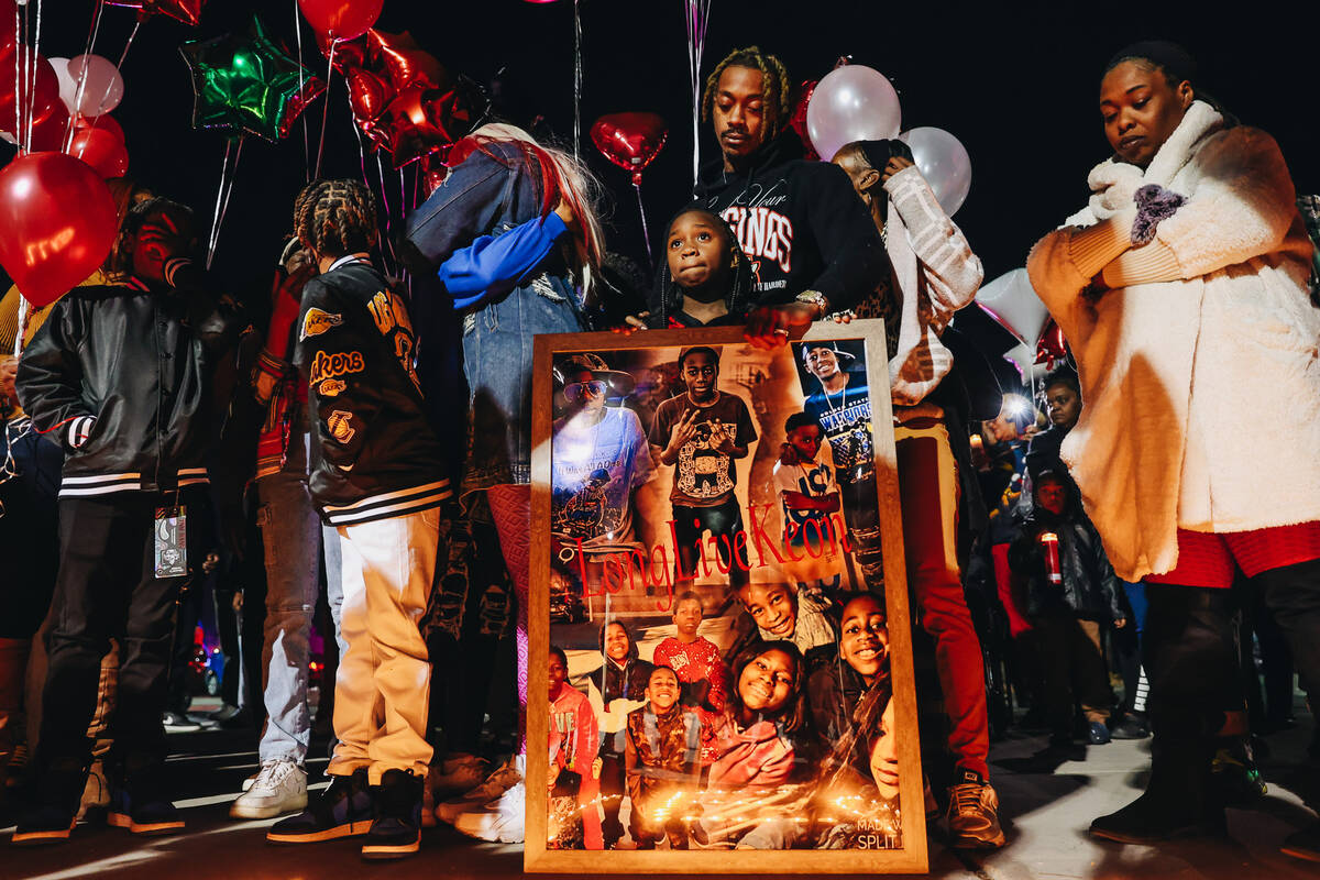 Friends and family gather during a vigil in honor of Keon Young at Desert Horizons Park on Frid ...