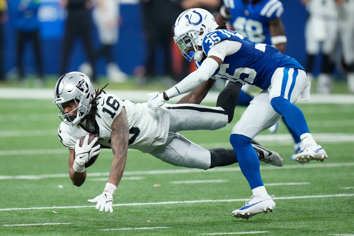 Las Vegas Raiders wide receiver Jakobi Meyers (16) makes a catch as Indianapolis Colts cornerba ...