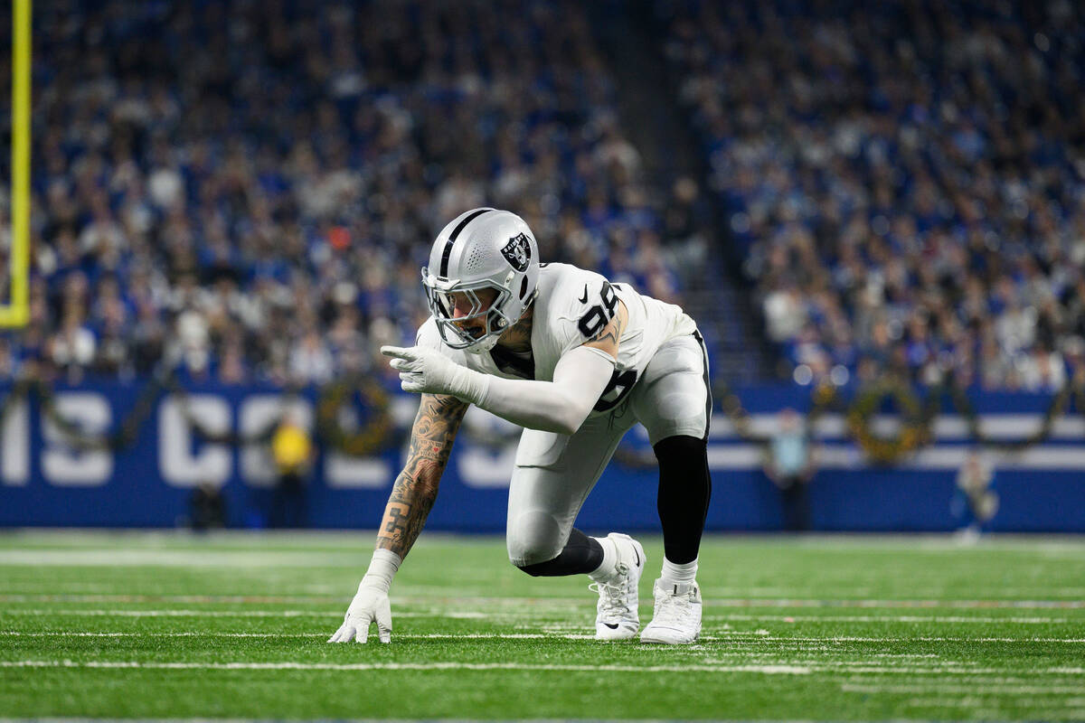 Las Vegas Raiders defensive end Maxx Crosby (98) lines up before the snap during an NFL footbal ...