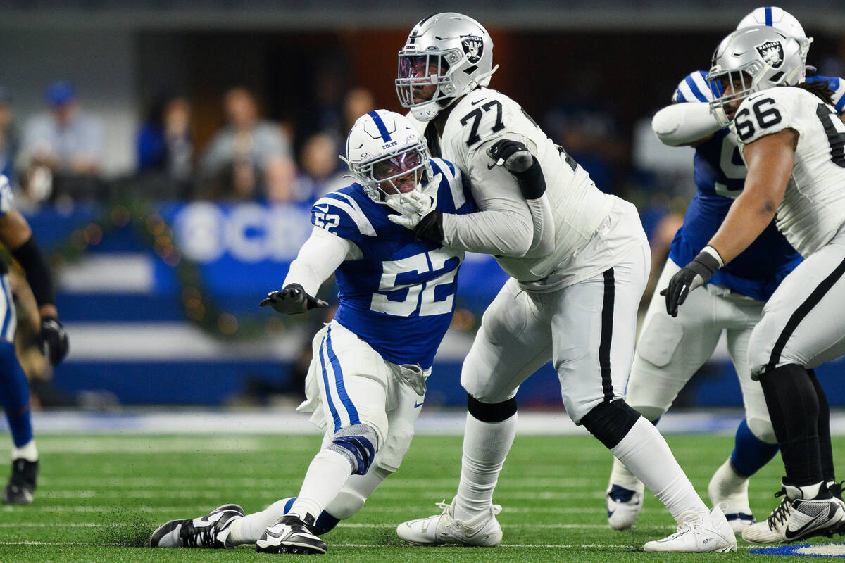 Las Vegas Raiders tackle Thayer Munford Jr. (77) blocks Indianapolis Colts defensive end Samson ...