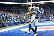 Las Vegas Raiders wide receiver Davante Adams (17) makes a touchdown catch past Indianapolis Co ...