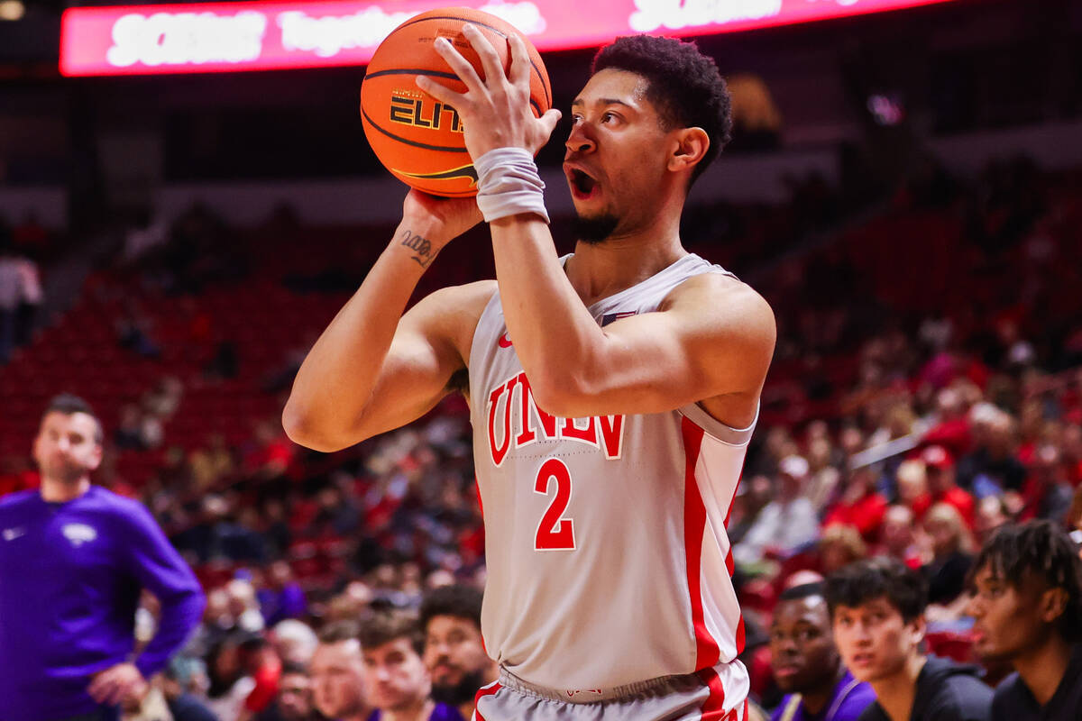 UNLV Rebels guard Justin Webster (2) prepares to shoot a three pointer during a college basketb ...