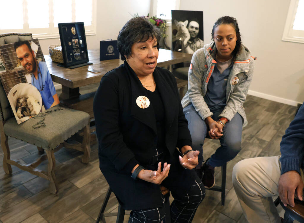 Susan Hernandez, left, the mother of the late Dr. Aaron Bivens, speaks about her son as Dr. Cha ...