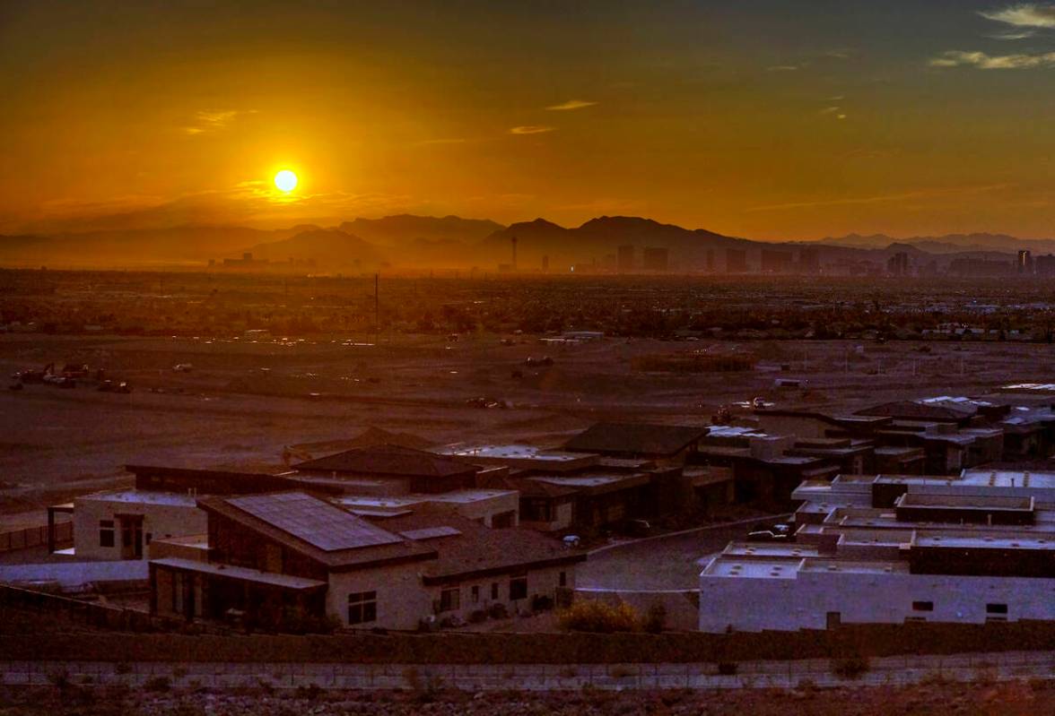 The sun rises over the valley and Strip on another high temperature day on Thursday, July 20, 2 ...