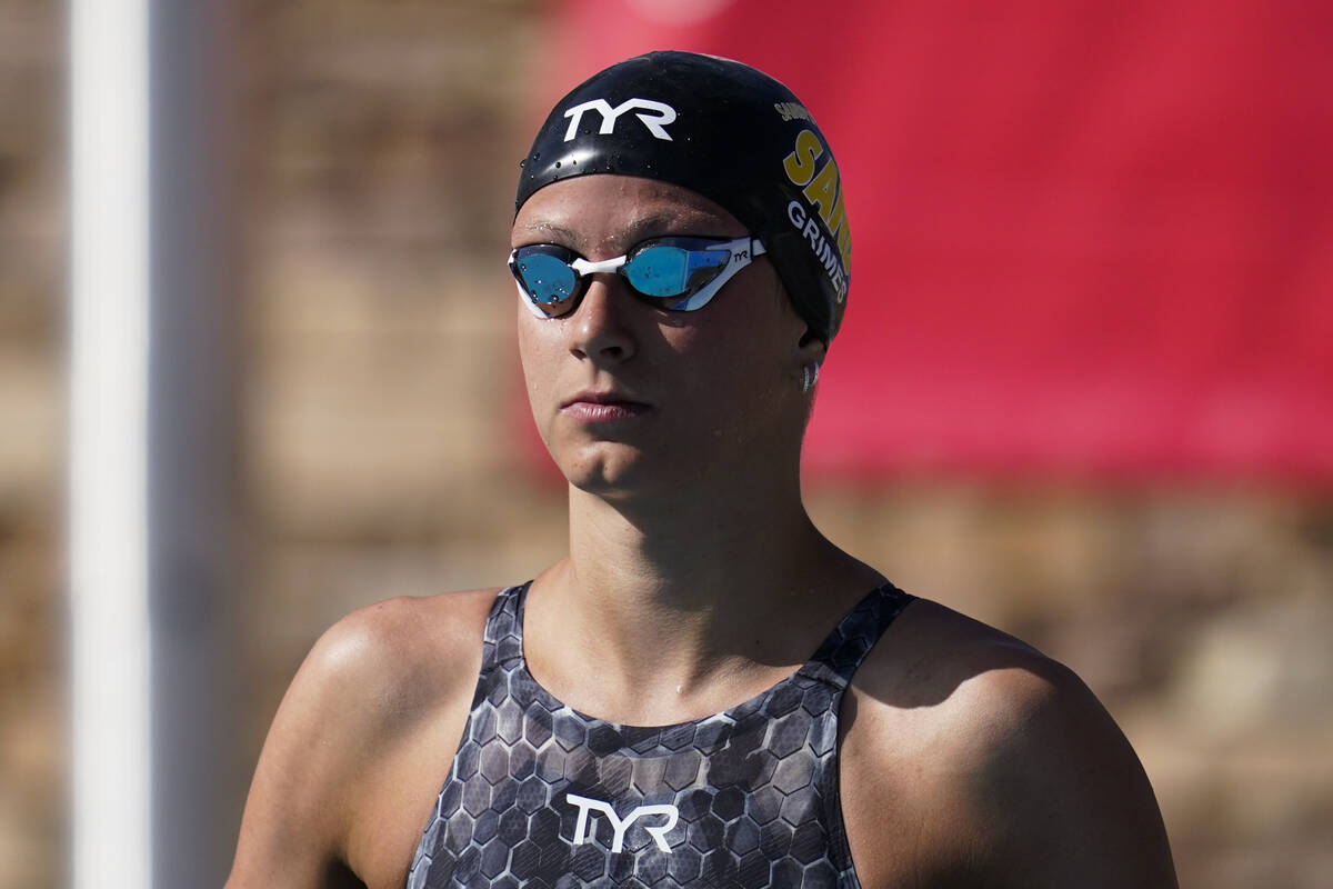 Katie Grimes pauses before competing in the women's 100-meter freestyle consolation final at th ...