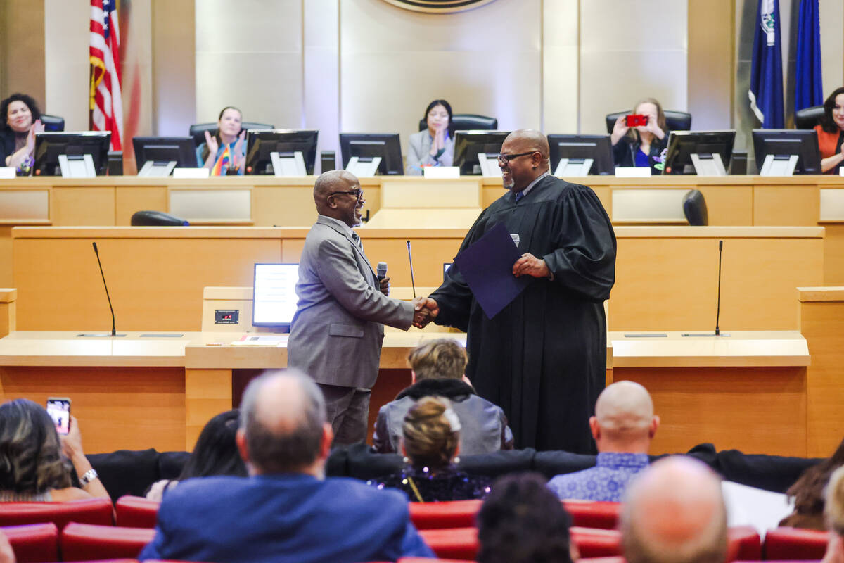 Dane Watson, a teachers union organizer, is sworn in as a nonvoting member of the Clark County ...