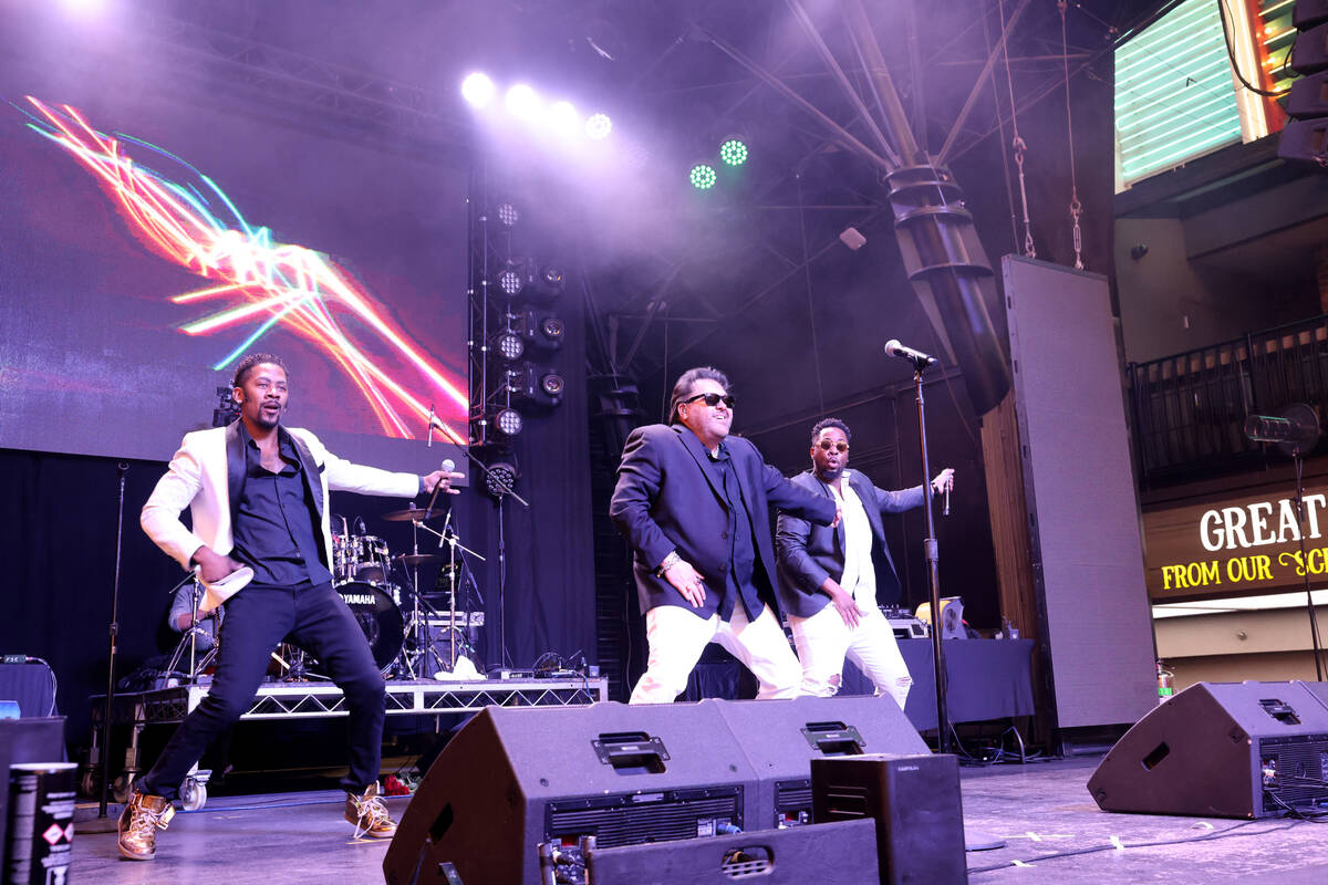 Color Me Badd performs for New Year’s Eve revelers on the First Street Stage during the ...