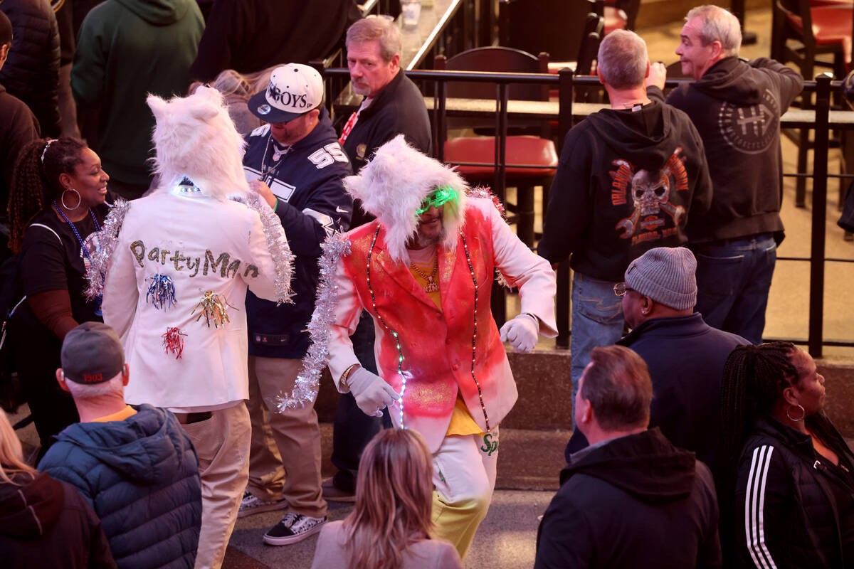 New Year’s Eve revelers celebrate during the Time of Your Life Festival at the Fremont S ...