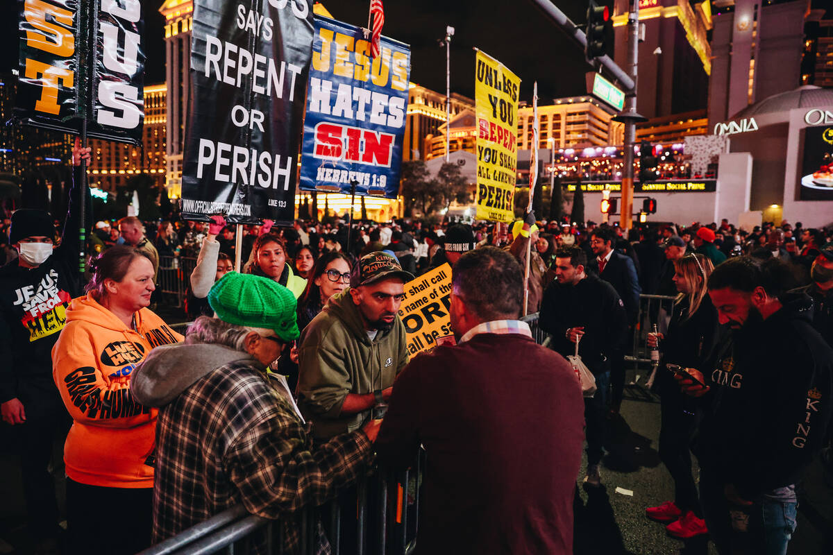 Religious demonstrators occupy part of the Strip during New Year’s Eve celebrations on S ...