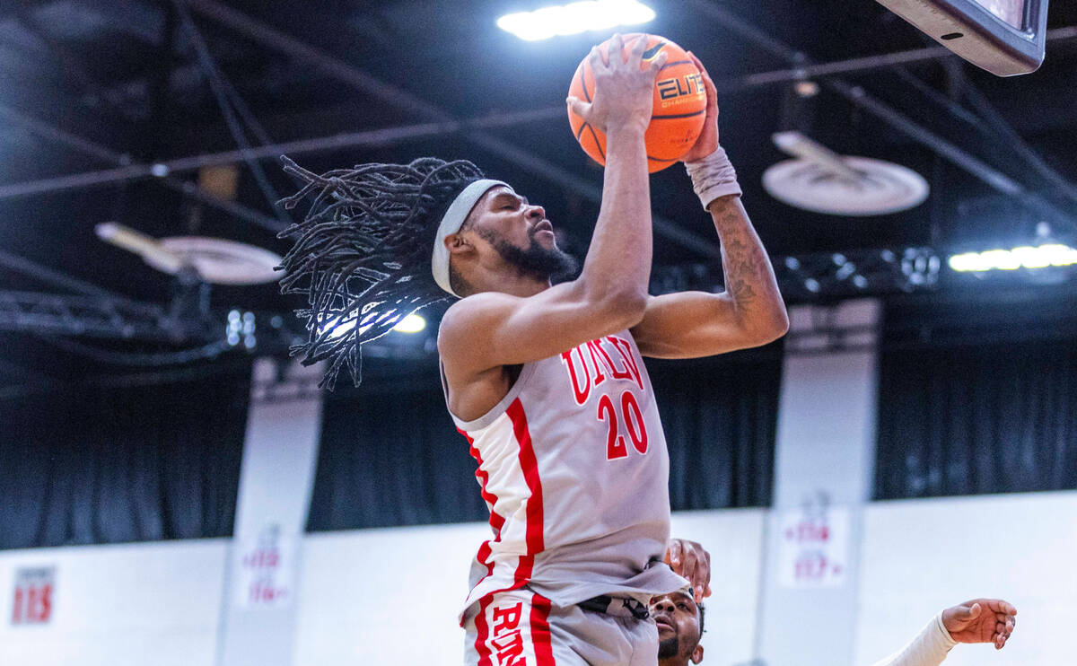 UNLV Rebels forward Keylan Boone (20) posts up for a basket against the Bethesda University Fla ...