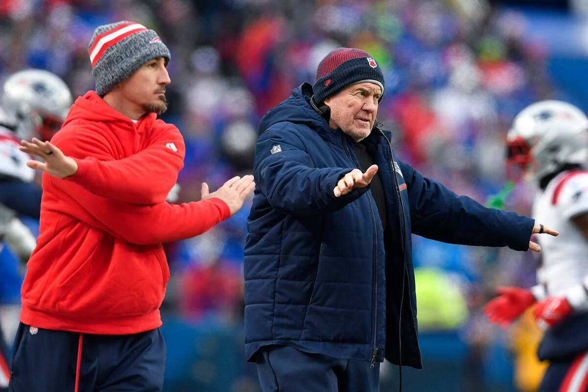 New England Patriots head coach Bill Belichick, right, and special teams coordinator Cameron Ac ...