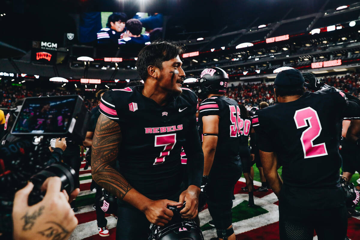 UNLV quarterback Cameron Friel (7) celebrates after beating Colorado State and becoming bowl el ...