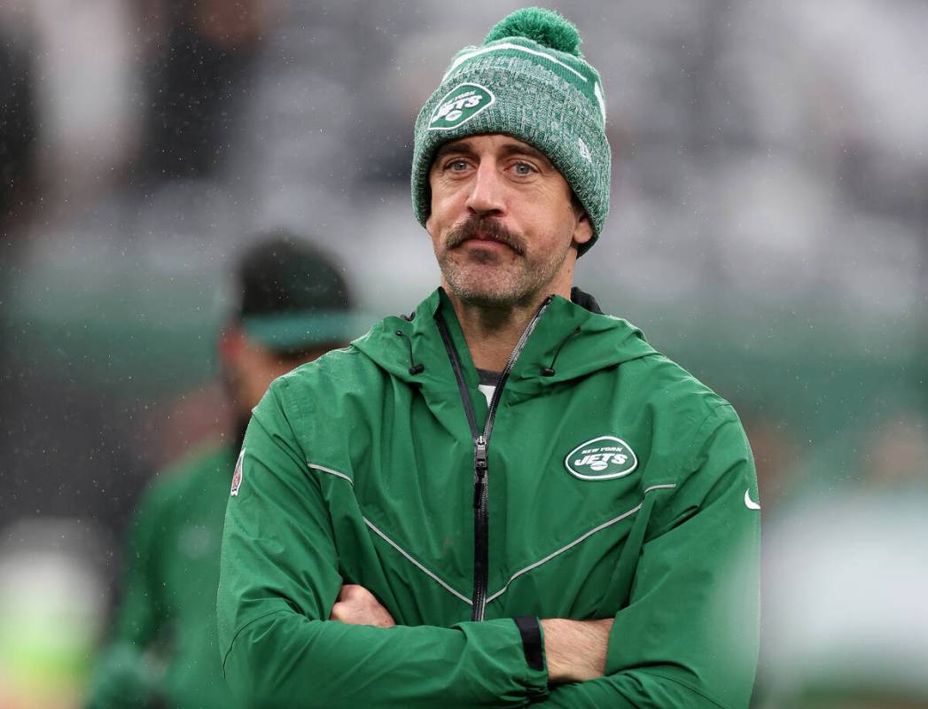 Aaron Rodgers of the New York Jets looks on during warmups prior to a game against the Atlanta ...