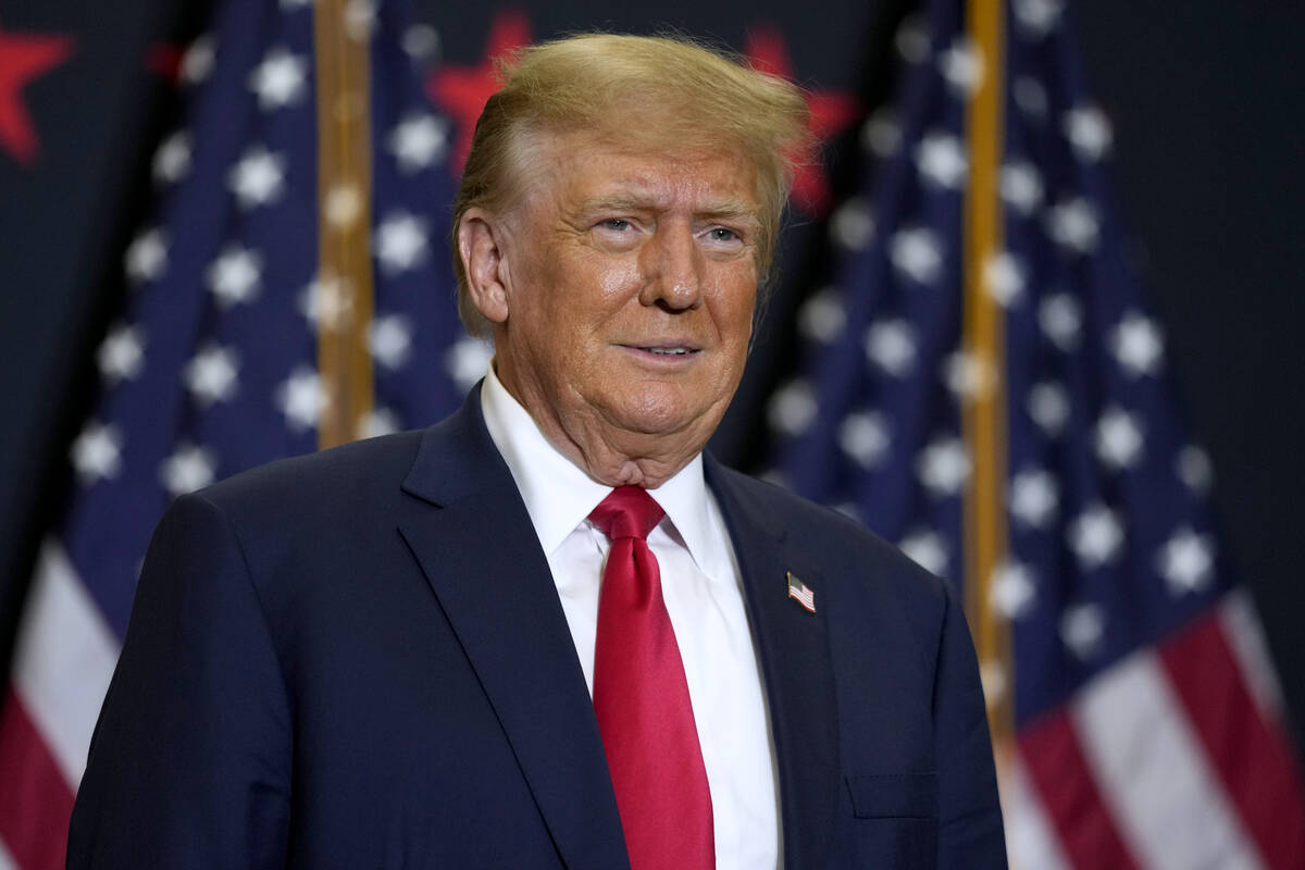 FILE - Former President Donald Trump speaks during a commit to caucus rally, Dec. 19, 2023, in ...