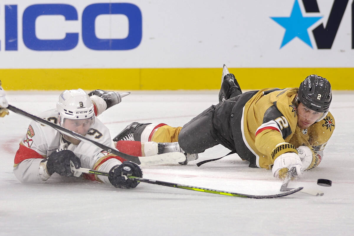 Florida Panthers center Sam Bennett (9) and Vegas Golden Knights defenseman Zach Whitecloud (2) ...