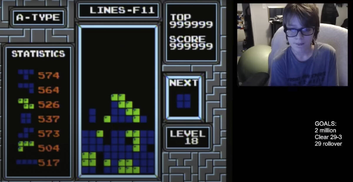 In this image taken from video, 13-year-old player named Willis Gibson plays a game of Tetris. ...