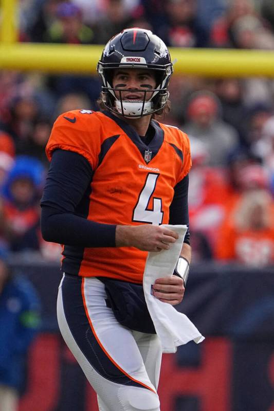 Denver Broncos quarterback Jarrett Stidham (4) against the Los Angeles Chargers of an NFL footb ...