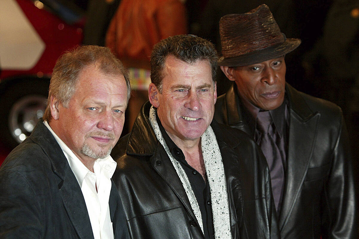 David Soul, left, Paul Michael Glaser, and Antonio Fargas, right, stars of the original 1970's ...