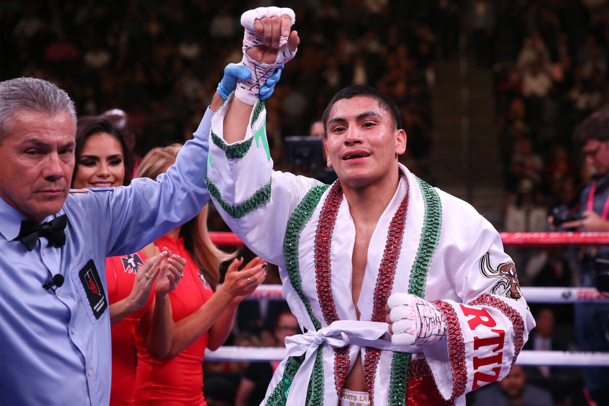 Vergil Ortiz Jr. celebrates his win by way of technical knockout in the third round of the welt ...